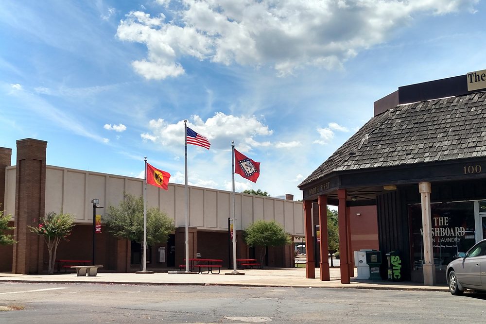Downtown Cabot, Arkansas with U.S., Arkansas, and city flags flying.